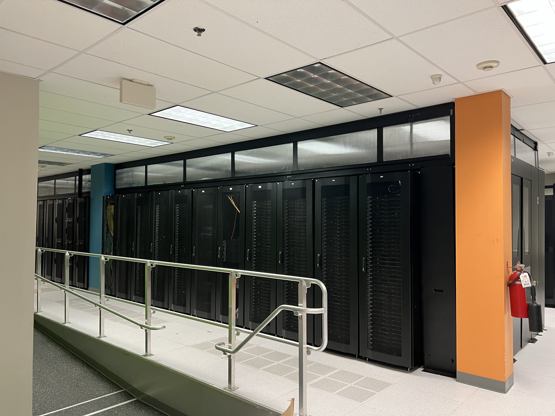 Data center racks used in Epoch Forge infrastructure work